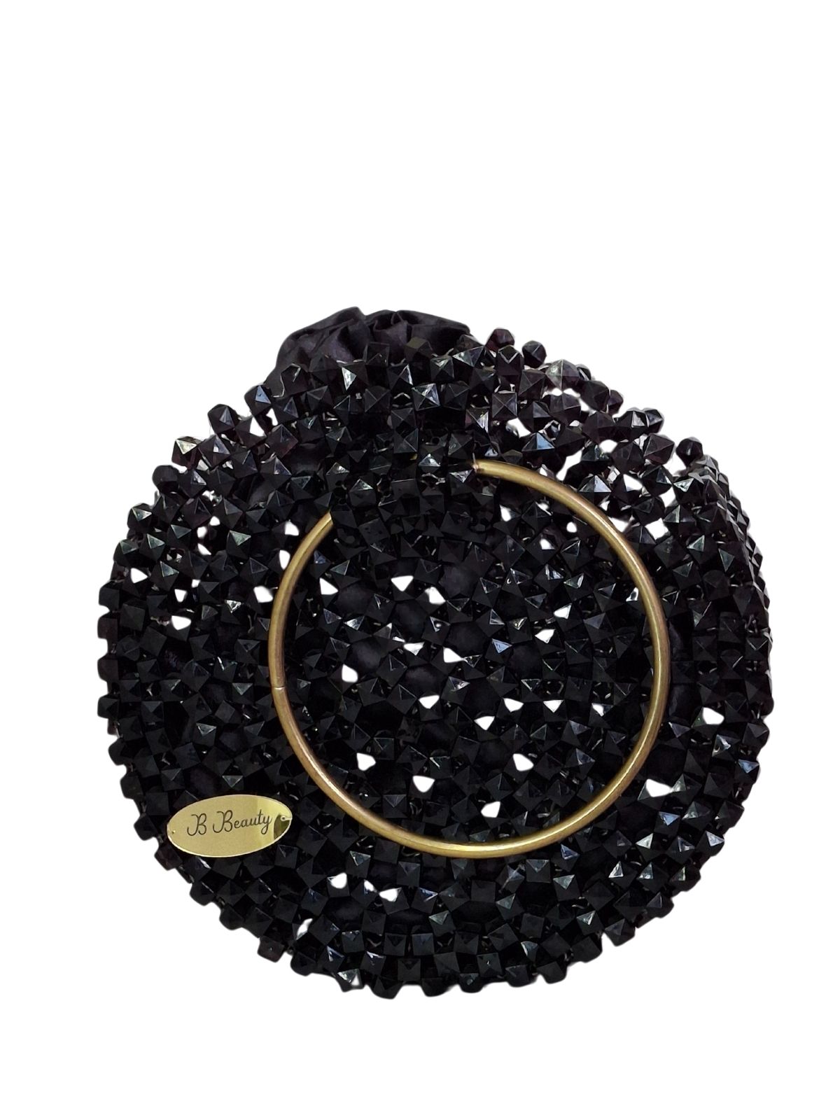 Black beaded clutch with gold accents on a white background