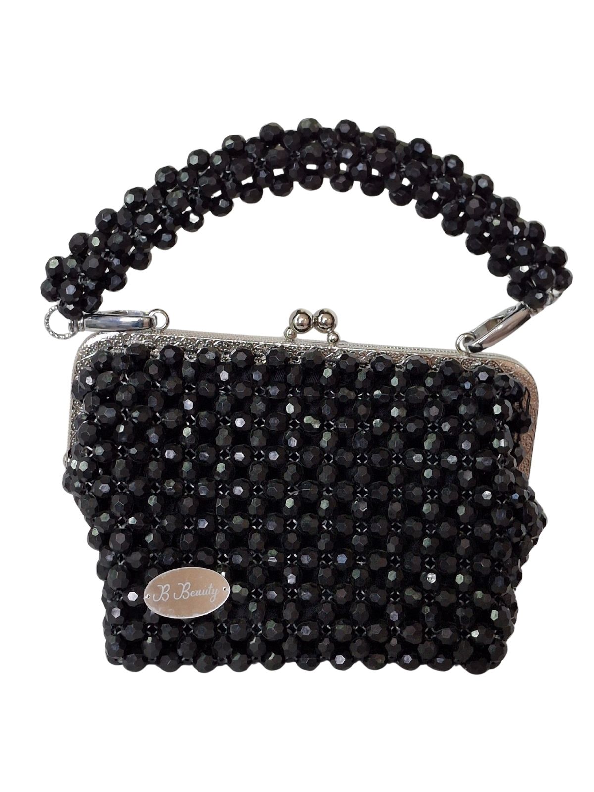 Black beaded handbag with a chain strap on a white background